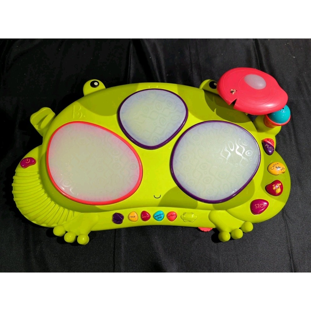 B. Toys Ribbit-Tat-Tat Interactive Music Lights Frog Drum Set With Drumsticks